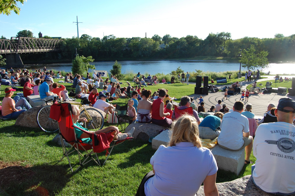 Eau Claire area residents and visitors attend a concert in Phoenix Park.