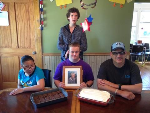 4 guests with a picture of Helen at Helen's party 2016