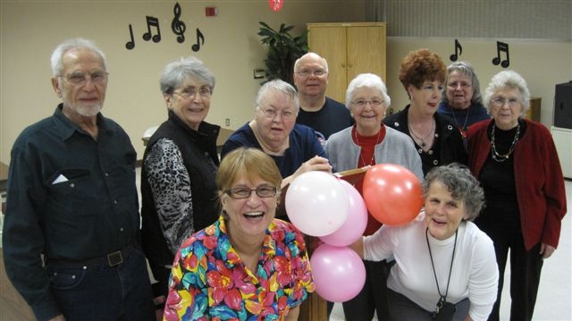 Group of seniors with balloons